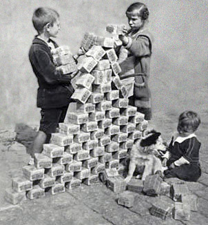 German children playing with bundles of money